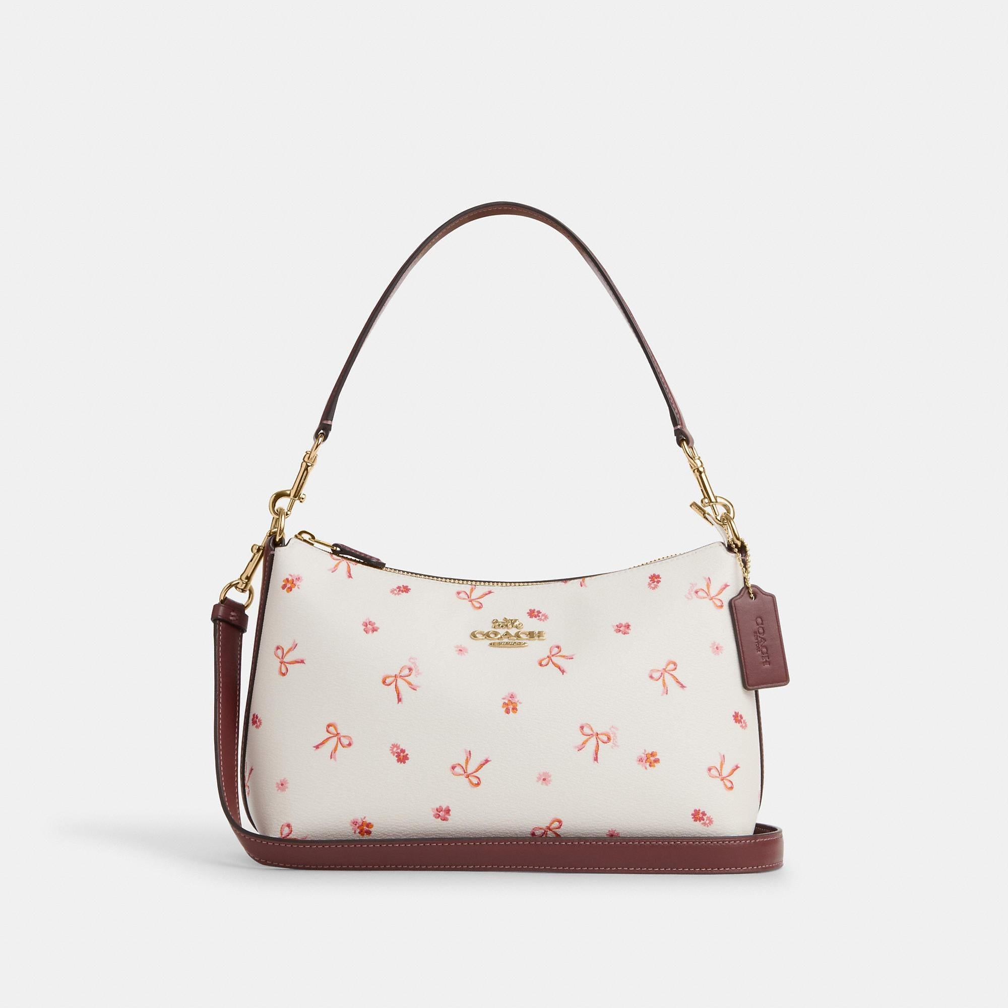 Pink bow teri coach bag