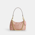Pink beaded coach bag