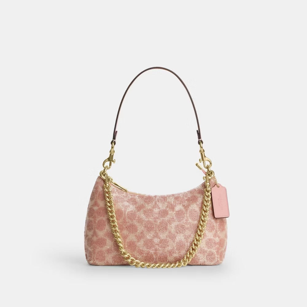 Pink beaded coach bag