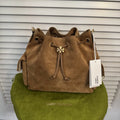 Tory Burch Quilted Suede Bucket Bag – Camel Brown