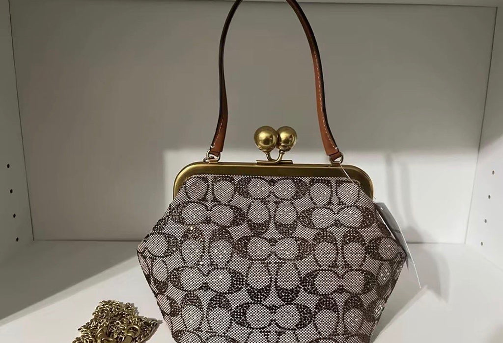 Coach Kisslock Frame Bag in Crystal Signature Jacquard.