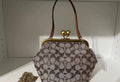 Coach Kisslock Frame Bag in Crystal Signature Jacquard.